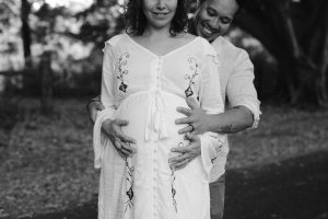 lovely shot of pregnant bride and proud father