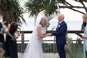 Heidi Robertson celebrant having some fun with the couple