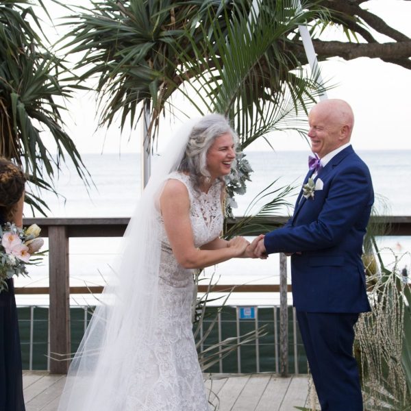 Heidi Robertson celebrant having some fun with the couple