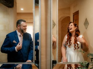 Having a laugh in front of the mirrors at Nutting Hill Villa